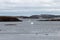 Small icebergs with mountain background, St Anthony`s newfoundland