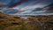 Small Inland Reservoir in the Ayrshire Hills above Fairlie with the Arran Hills only in Part View due to the Haze on the River