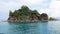 A small island in the middle of the sea with beautiful shallow corals at Koh Chang