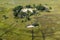 Small island in the Okavango Delta seen from heli