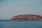 Small island outside Vardo with a lighthouse to guide ships when it is dark in Norway