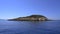 Small Islet Island Formed by Accumulation of Rock Deposits Atop a Reef In Sea