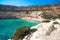 The small isolated gulf of Vathi, in Crete, with sandy beach and some lucky campers.