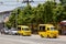 small Japanese trucks converted into taxis for tourists called tuk tuk in Thailand on the island of Phuket. Multi-colored cars on