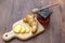 Small jar of honey and   ginger  on wooden background