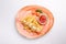 Small kid`s meal. A plate of chicken nuggets with french fries with ketchup on a white background. Top view children`s menu food