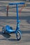 Small kids blue kick scooter 