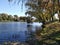 A small lake in the countryside. Yellow and green leaves