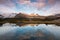 Small lake at the Key Summit, Routeburn track, New Zealand. Hiking in the mountains the key summit track, Southern Alps, Fiordland