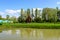 Small lake with a woodmill and an island from Chindiei Park (Parcul Chindiei) in Targoviste, Romania