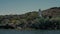 Small lighthouse on a cliff face above a desert river or lake in Arizona