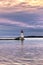 Small lighthouse at the end of a rock jetty. Jackson`s Point - Lake Simcoe Canada