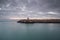 Small lighthouse and Water breaker at Oeiras` Marina