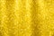 Small lights of gold glitter background