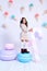 Small little girl beautiful lady curly hair child wear funny clothes dress socks boots cute face smile sweets baby shower party b