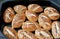 Small loaves of bread on cookie sheet