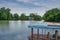 Small local ferry boat docking along the river,