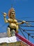 A small Lord Shiva statue at the roof of one of many Hindu temples in Mauritius