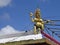 A small Lord Shiva statue at the roof of one of many Hindu temples in Mauritius