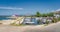 Small marina with moored motorboats in Zaton bay with Dinaric Alps in background  Croatia