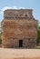 Small Mayan temple, adorned with engraved stones, in the archaeological area of Chichen Itza