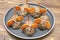 Small meatball mouse, meatloaf mice with ears of carrot on plate, creative and fun food snack idea for kids party. Menu