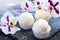 Small meringue cakes Pavlova with glaze and coconut. Selective f