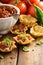 Small mexican style appetizers made with tortilla bowls