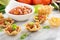 Small mexican style appetizers made with tortilla bowls