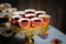 Small mini tarts cheesecake cups finger food berry jam snack