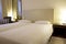 Small modern hotel room beds