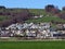 A small modern Swiss settlement or village Wauwil on the slopes of the hill Egozwilerberg - Canton of Lucerne, Switzerland