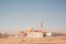 Small mosque in southern Omani with dome and minaret