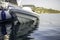 Small motorboat at the dock with beautiful reflections in the water