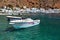 Small motorboats at clear water bay of Loutro town on Crete island, Greece
