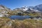 Small mountain lake long an high path in South Tyrol