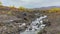 Small mountain river with clean water. Natural source of clean water in the mountains.