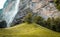 Small mountain waterfall. Summer alpine mountain landscape. Famous valley of waterfalls in Lauterbrunnen