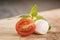 Small mozzarella balls with plum tomato