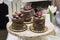 Small naked cakes with chocolate layers and fruits