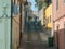 Small narrow street in Portugal with traditional Portuguese architecture houses