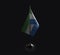 Small national flag of the Sierra Leone on a black background