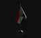 Small national flag of the Sudan on a black background