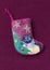 Small needlepoint Christmas stocking with cat