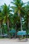 Small Nipa bamboo huts On the Beach under palm