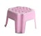 Small old pink plastic stool isolated on white