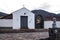 Small old rustic chapel in the middle of hills and colorful mountains of the calchaquies valleys in La Poma Argentina