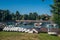 Small Optimist class boat on wharf after regatta