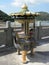 Small ornamental buddist shrine with incense sticks