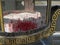 Small ornamental buddist shrine with incense sticks